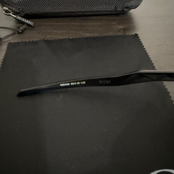 OO9406  Oakley SUTRO Black Matte Frame Silver Icons - Picture 6 of 9